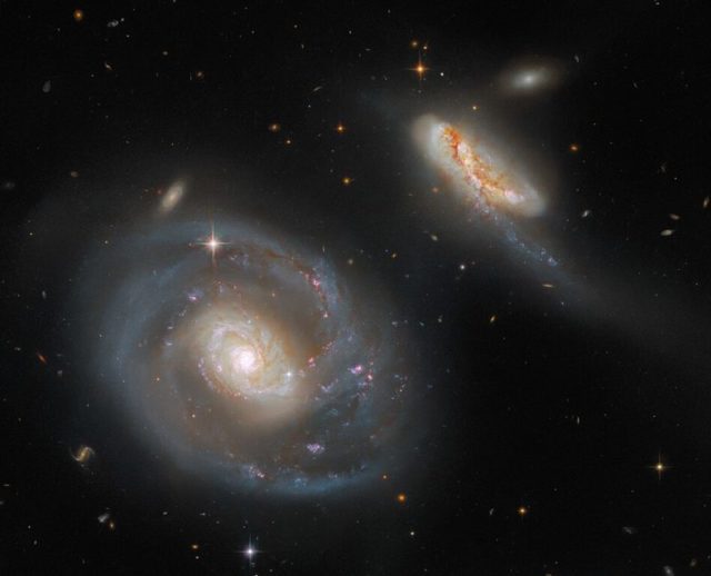 NGC 7469: Home to a Supermassive Black Hole and Starburst